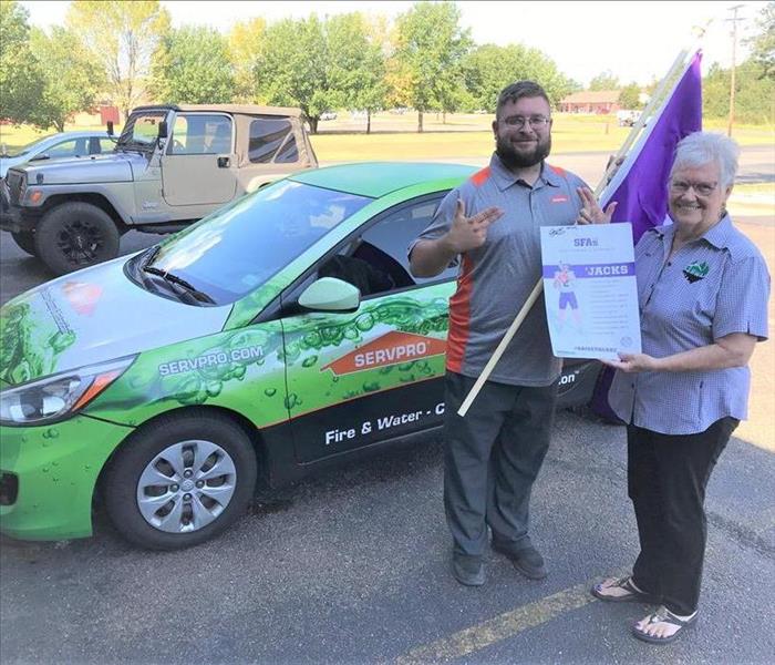 SERVPRO Employee accepting award