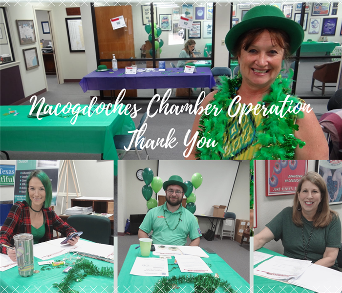 SERVPRO employee with 3 others sitting at St. Patrick Table