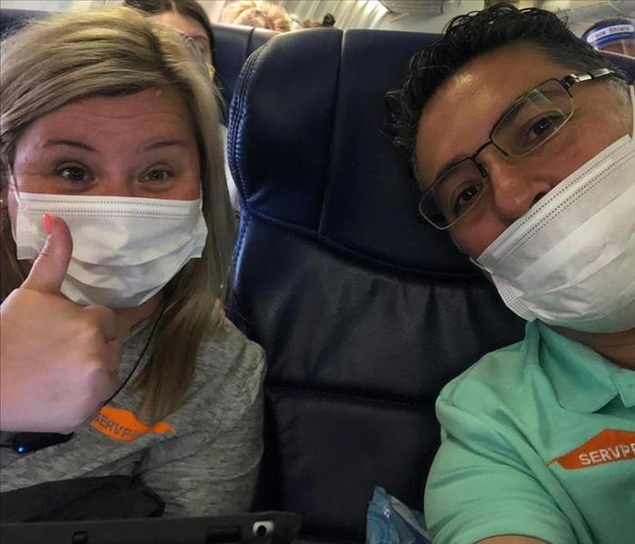 Two people onboard a plane.