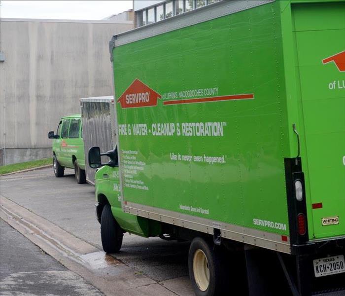 SERVPRO vehicles in the field.