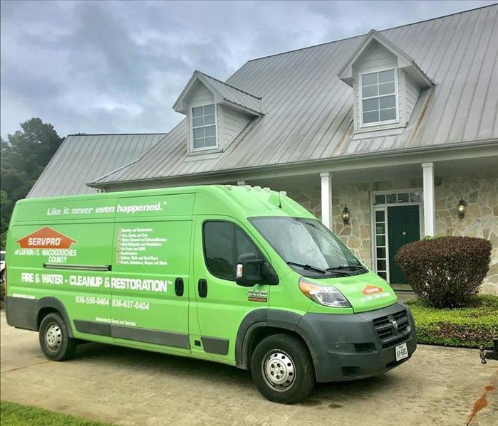 SERVPRO vehicle in front of home