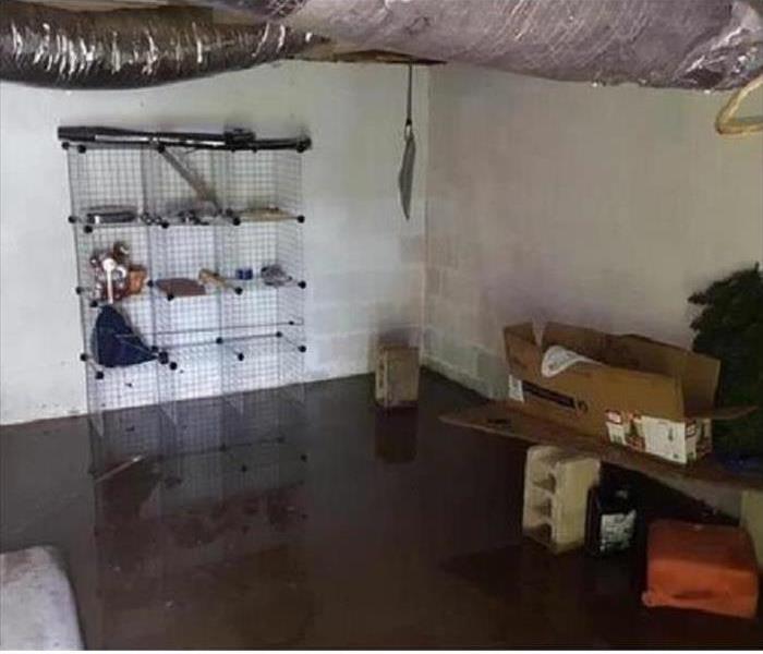 A flooded basement after heavy storms.
