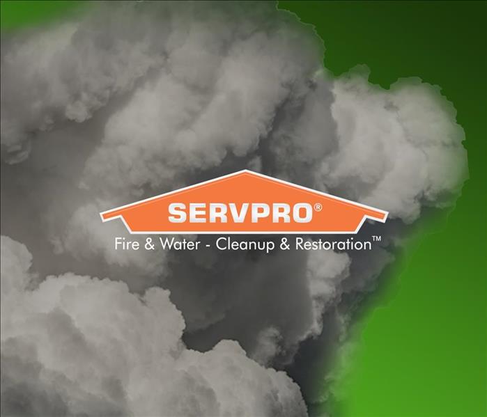 SERVPRO logo in front of dark raincloud