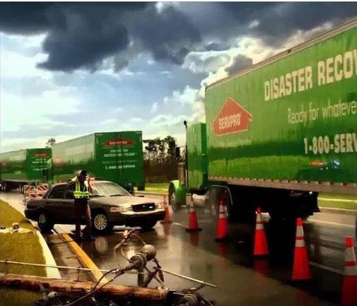 SERVPRO vehicles on scene of an accident.