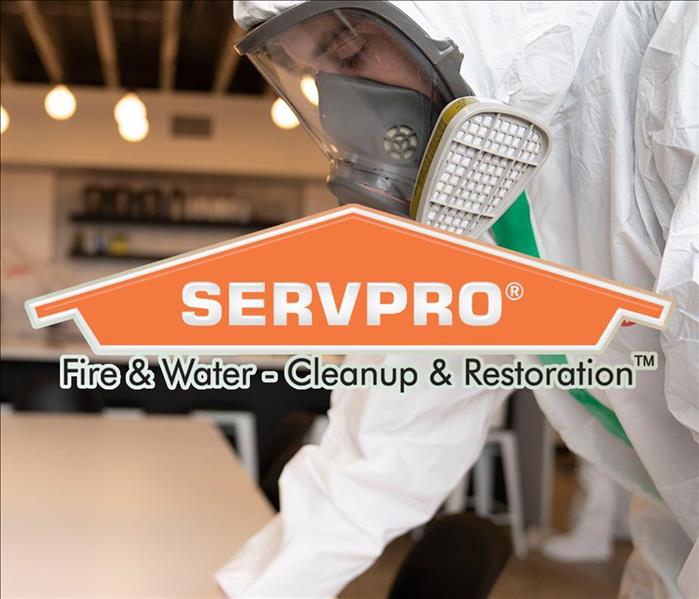 SERVPRO cleaning professional at work cleaning